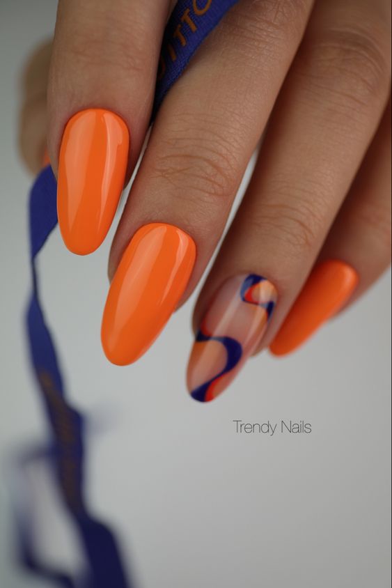Pomarańczowy manicure z wzorami
